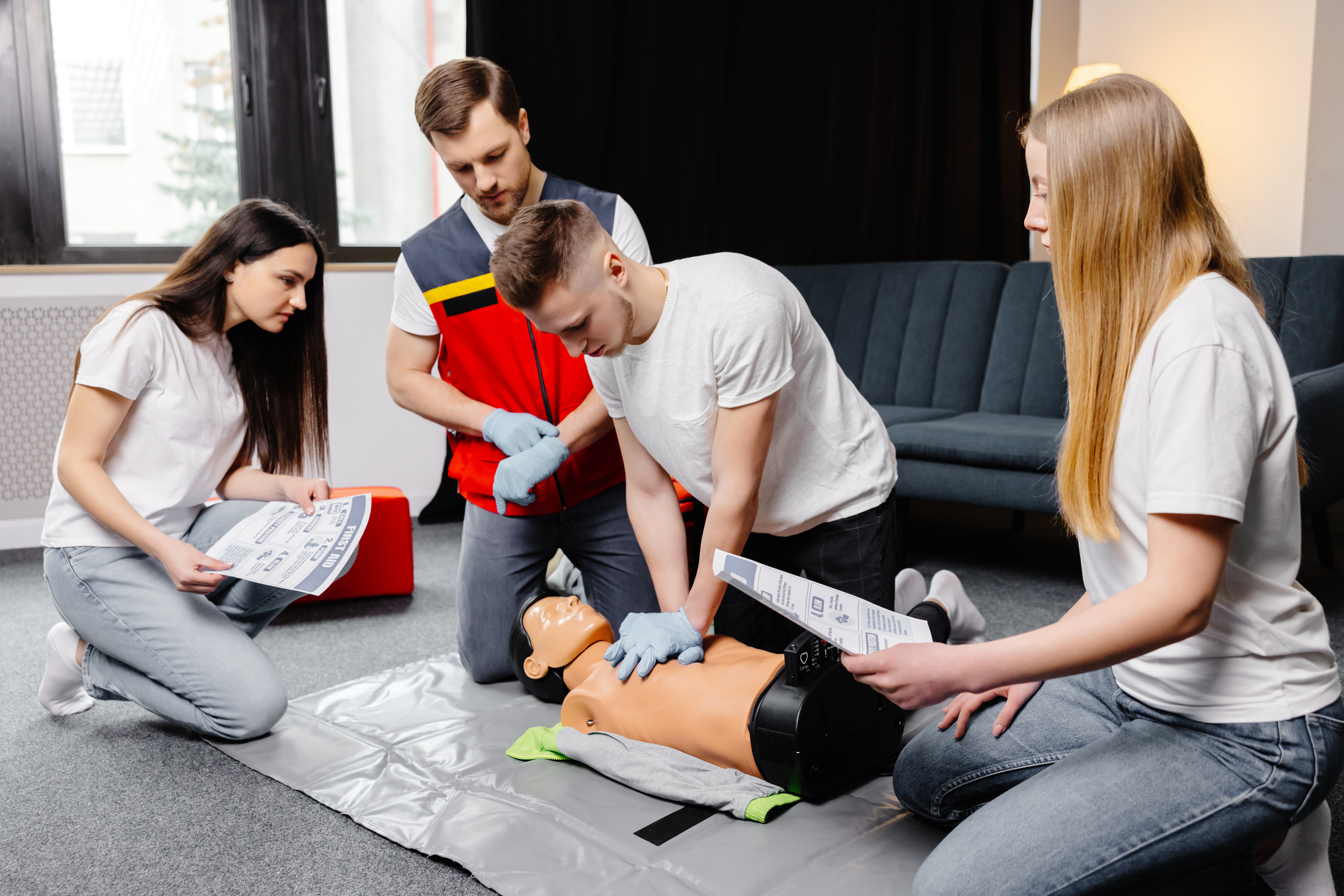 man-instructor-helping-to-make-first-aid-heart-com-2026-01-08-23-01-16-utc.JPG